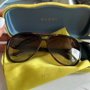 Never worn aviator sunglasses in mocha brown.